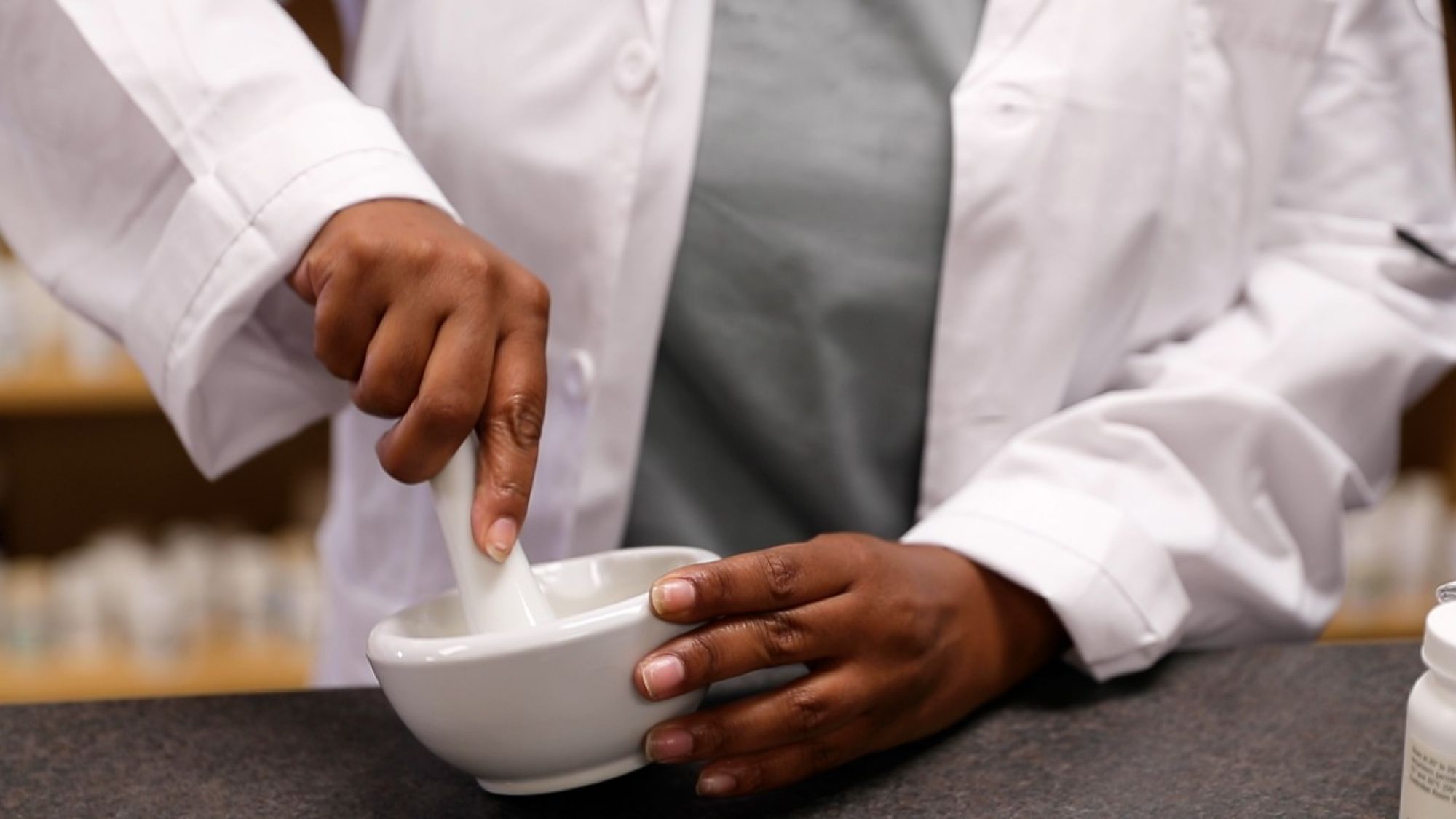 PT-Landover-Student-using-mortar-and-pestle