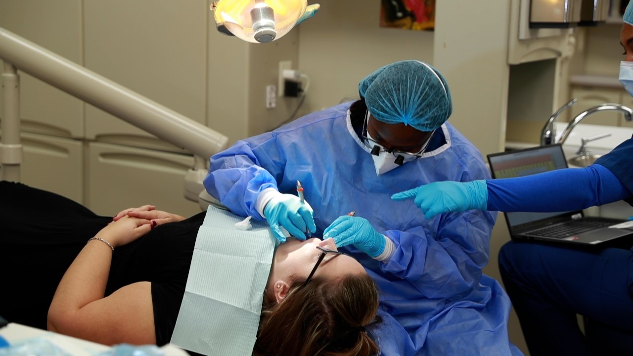 dental student working on patient